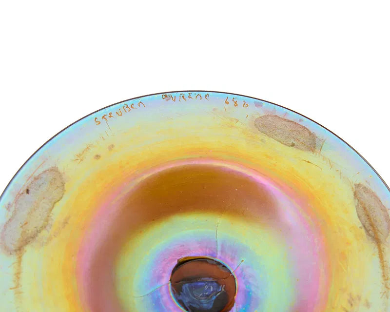 A Steuben Aurene glass candle stick holder